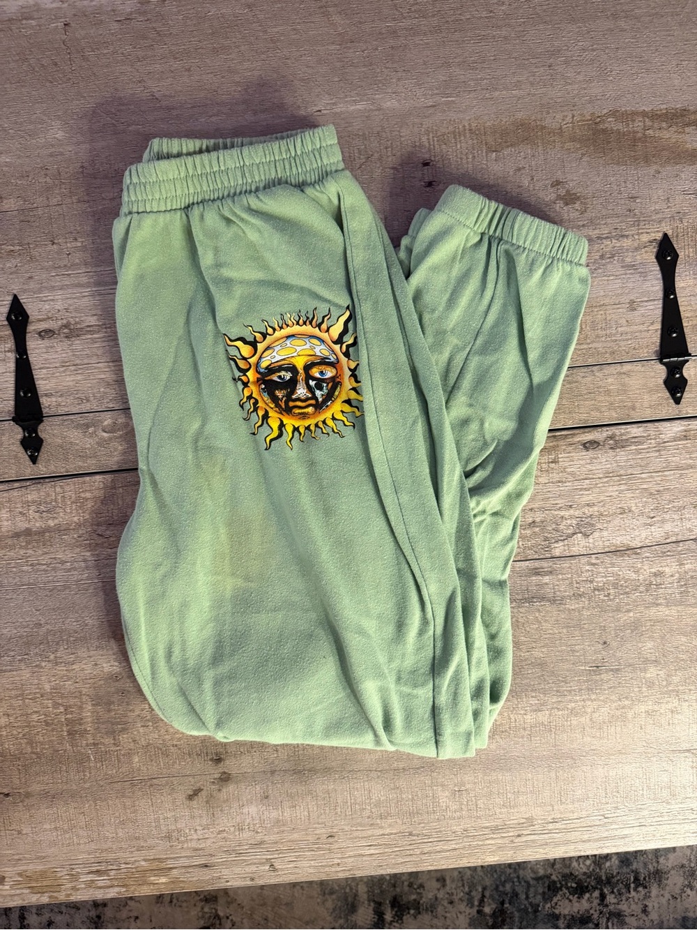 SHEIN Sage Green Joggers with Sun Graphic